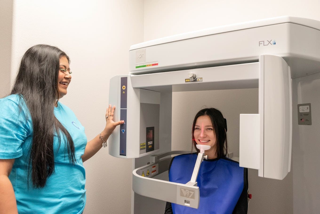 A patient getting an X-ray while visiting the dentist in Midlothian, TX
