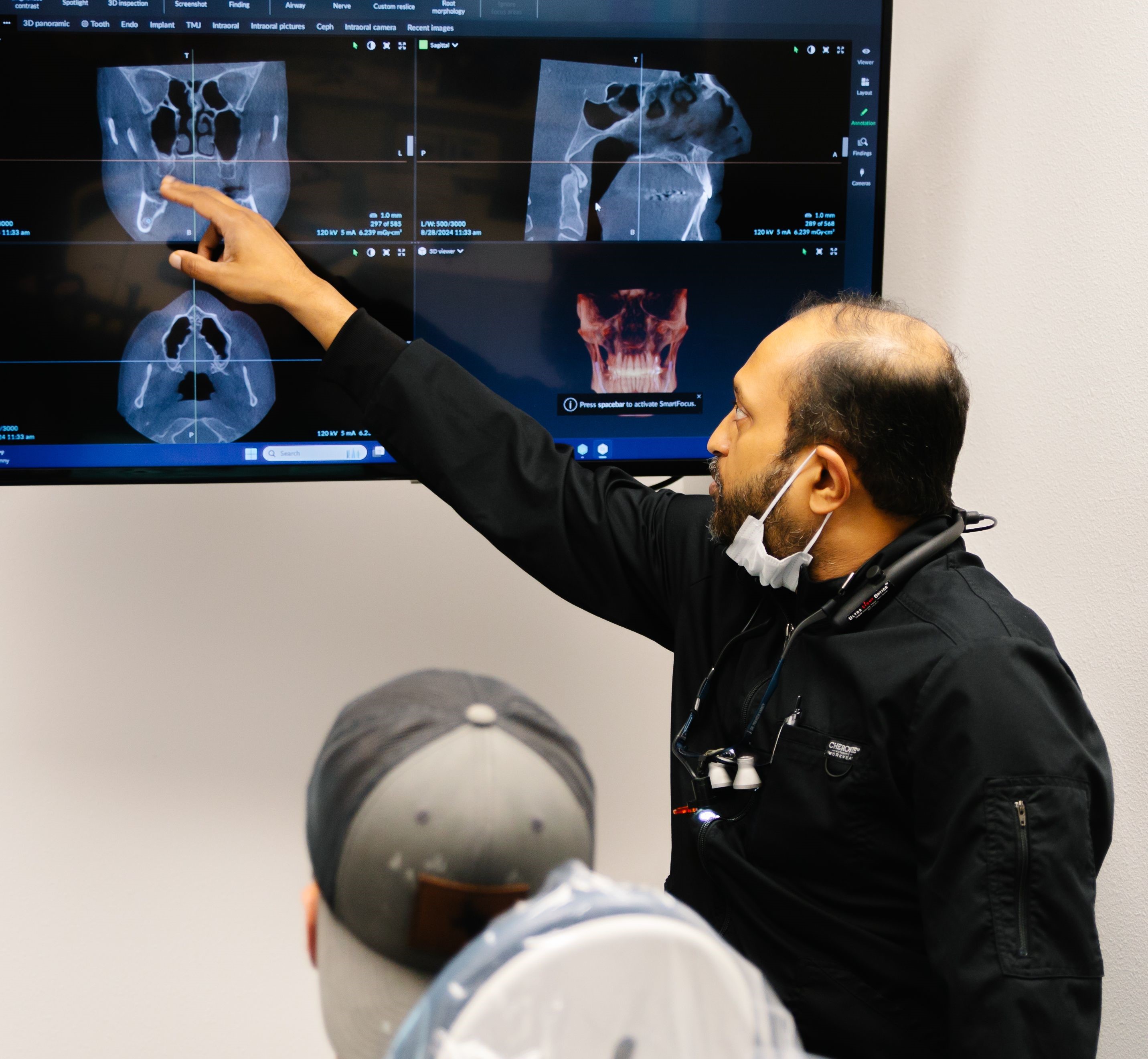 A patient getting an X-ray while visiting the dentist in Midlothian, TX