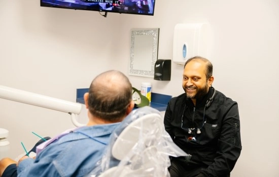 Dentist talking to a patient