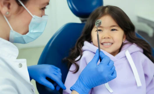 child getting teeth restored